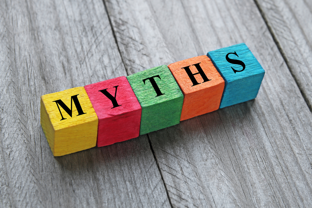 word myths on colorful wooden cubes